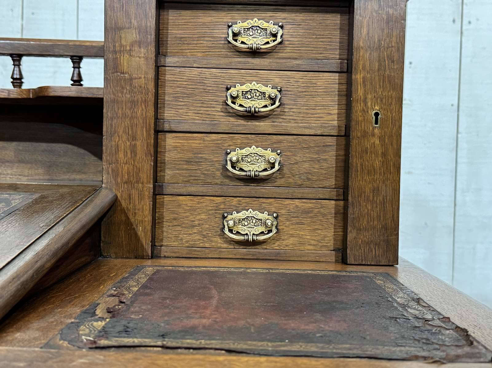English oak graduated desk from the late 19th century.