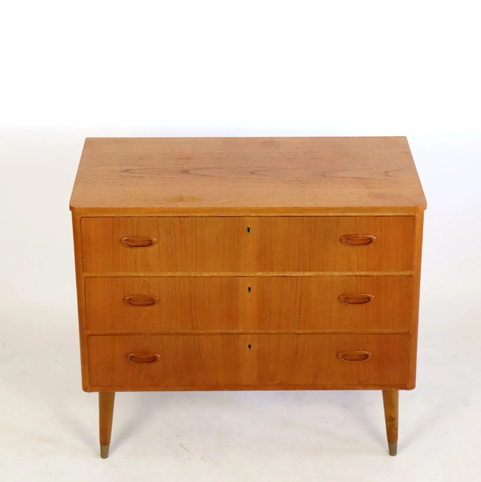 Commode en teck trois tiroirs