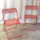 Orange metal folding chairs (set of 2) - 70s/80s