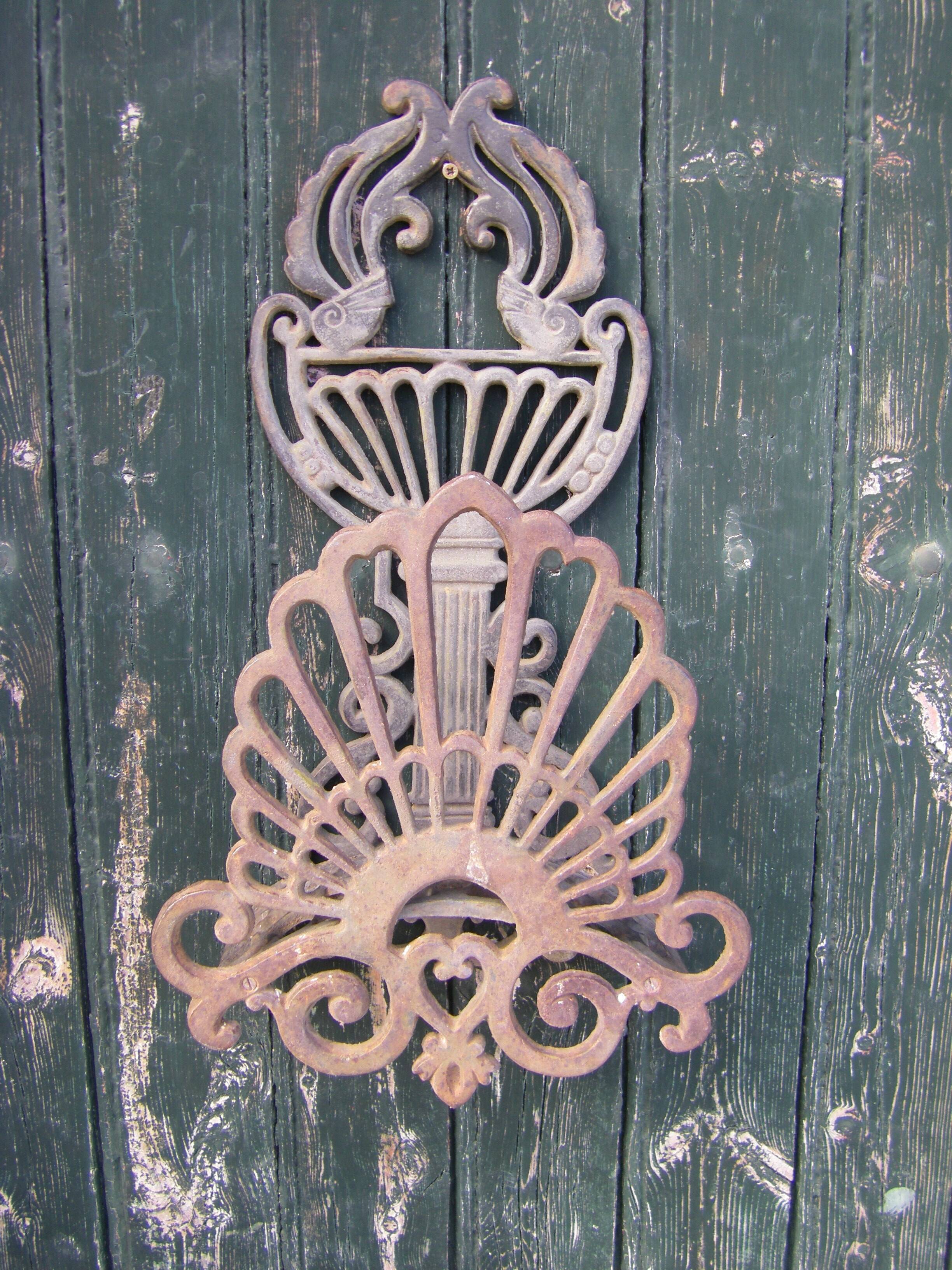 Cast iron garden pipe holder