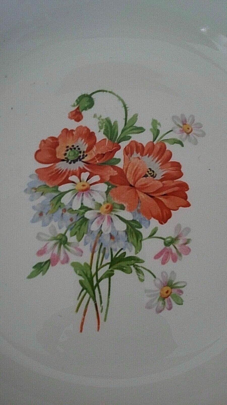 Hollow earthenware dish Saint Amand early twentieth floral decoration