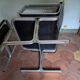 Pair of leather and aluminum armchairs