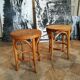 Pair of curved wooden stools