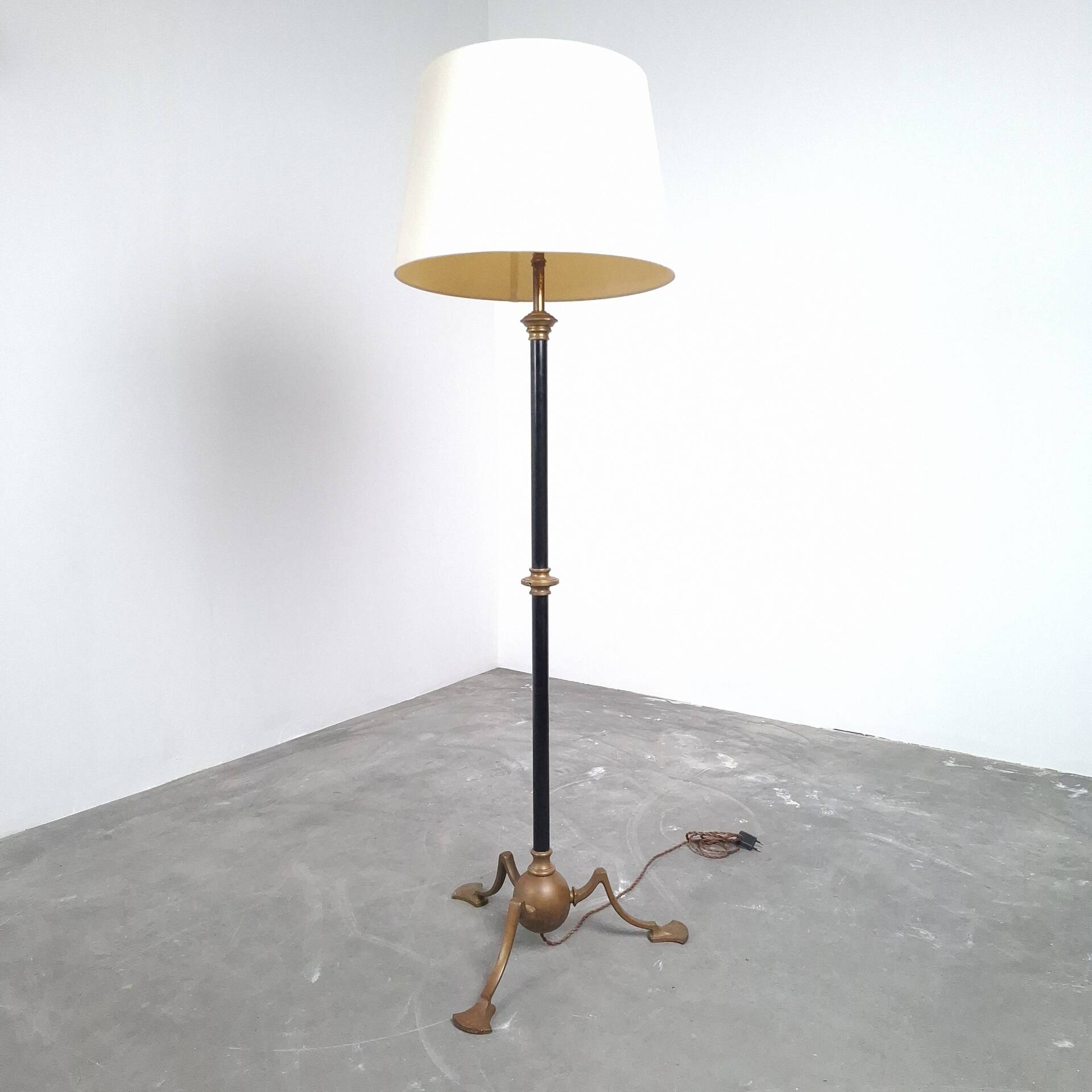 Art and Craft tripod floor lamp in bronze.