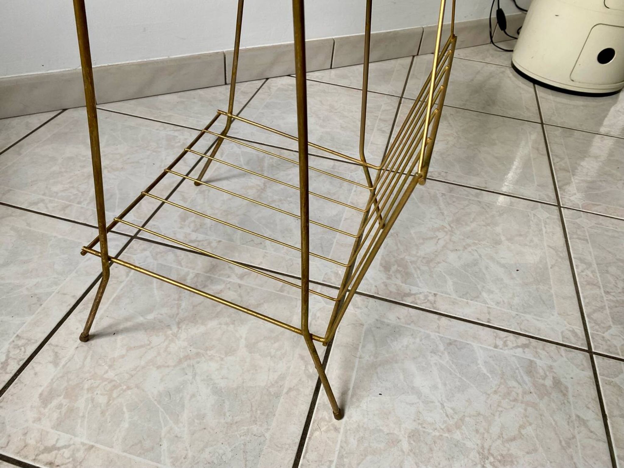Vintage 1960s brass and smoked glass side table with magazine holder.