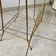 Vintage 1960s brass and smoked glass side table with magazine holder.