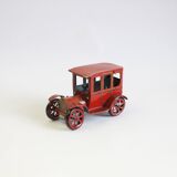 Vintage tin car with pull lever