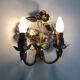 Pair of gilded metal sconces decorated with flowers and foliage. Year 60