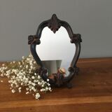 Vintage fiddle mirror to put down.