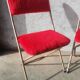 Pair of folding chairs in vintage red moumoute