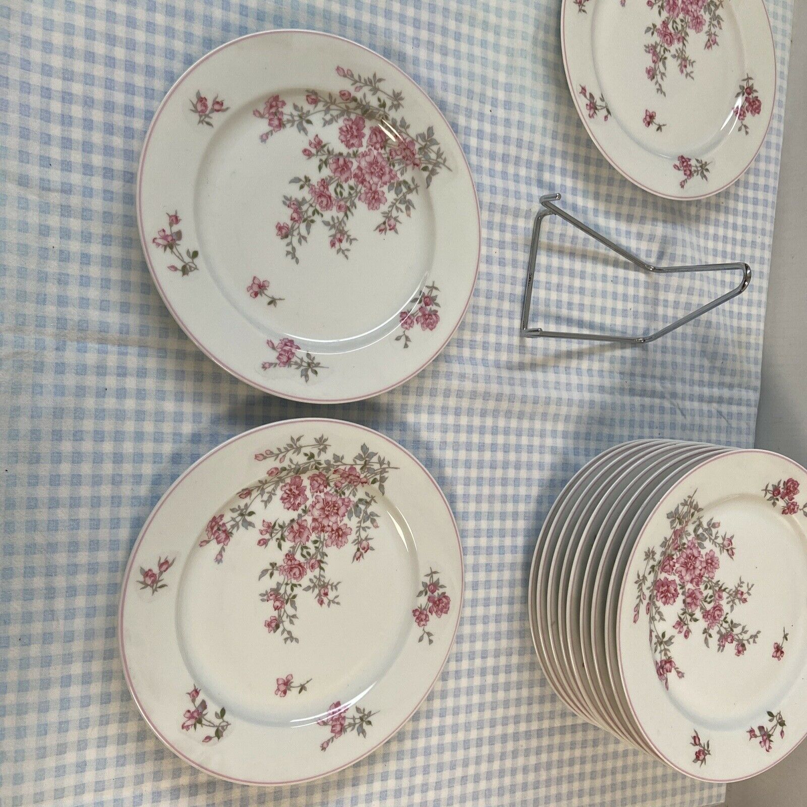 Series of 12 porcelain dessert plates decorated with flowers Bernardaud Limoges