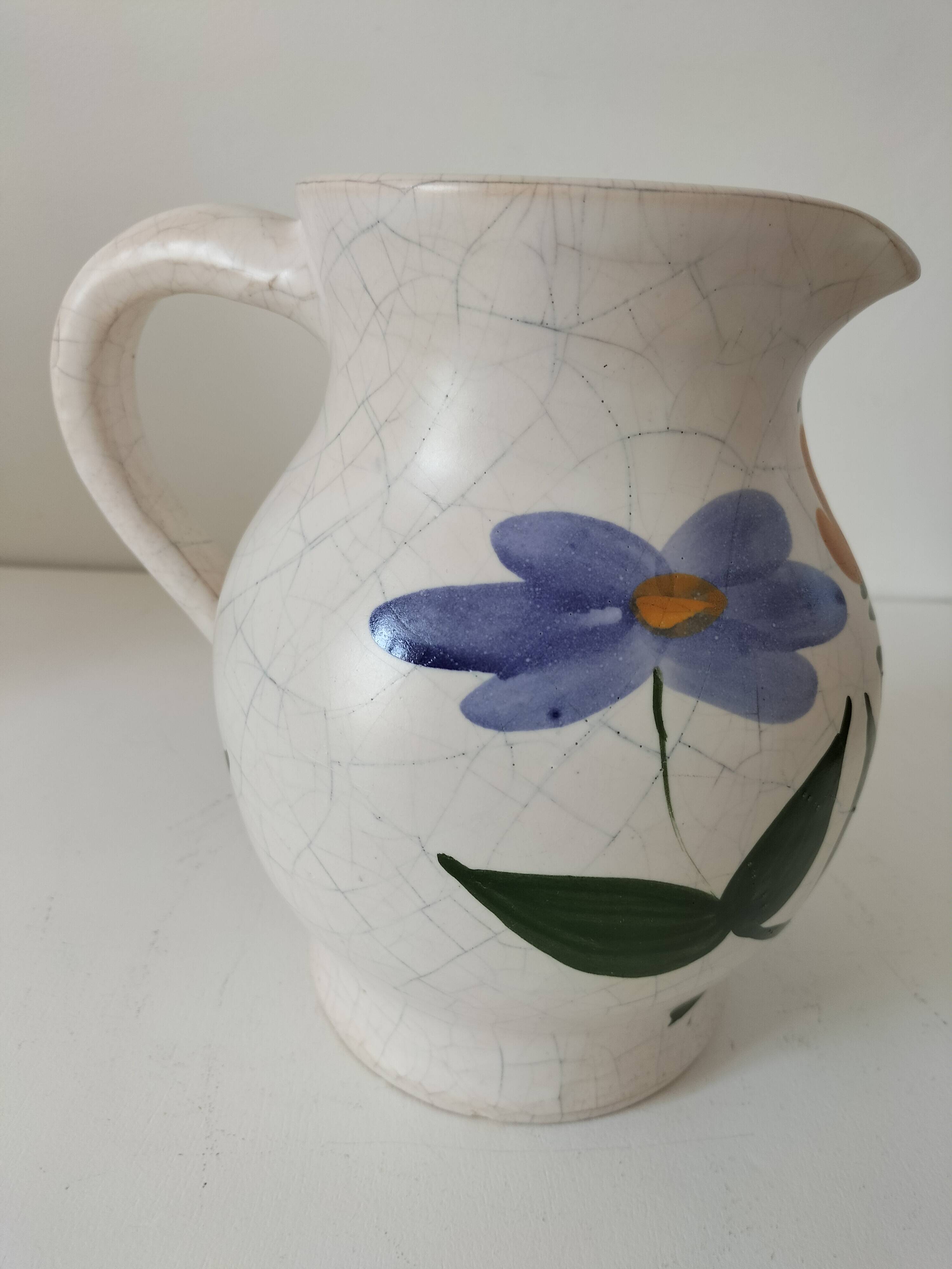 Vintage pitcher with floral decoration in the style of Poterie du Marais