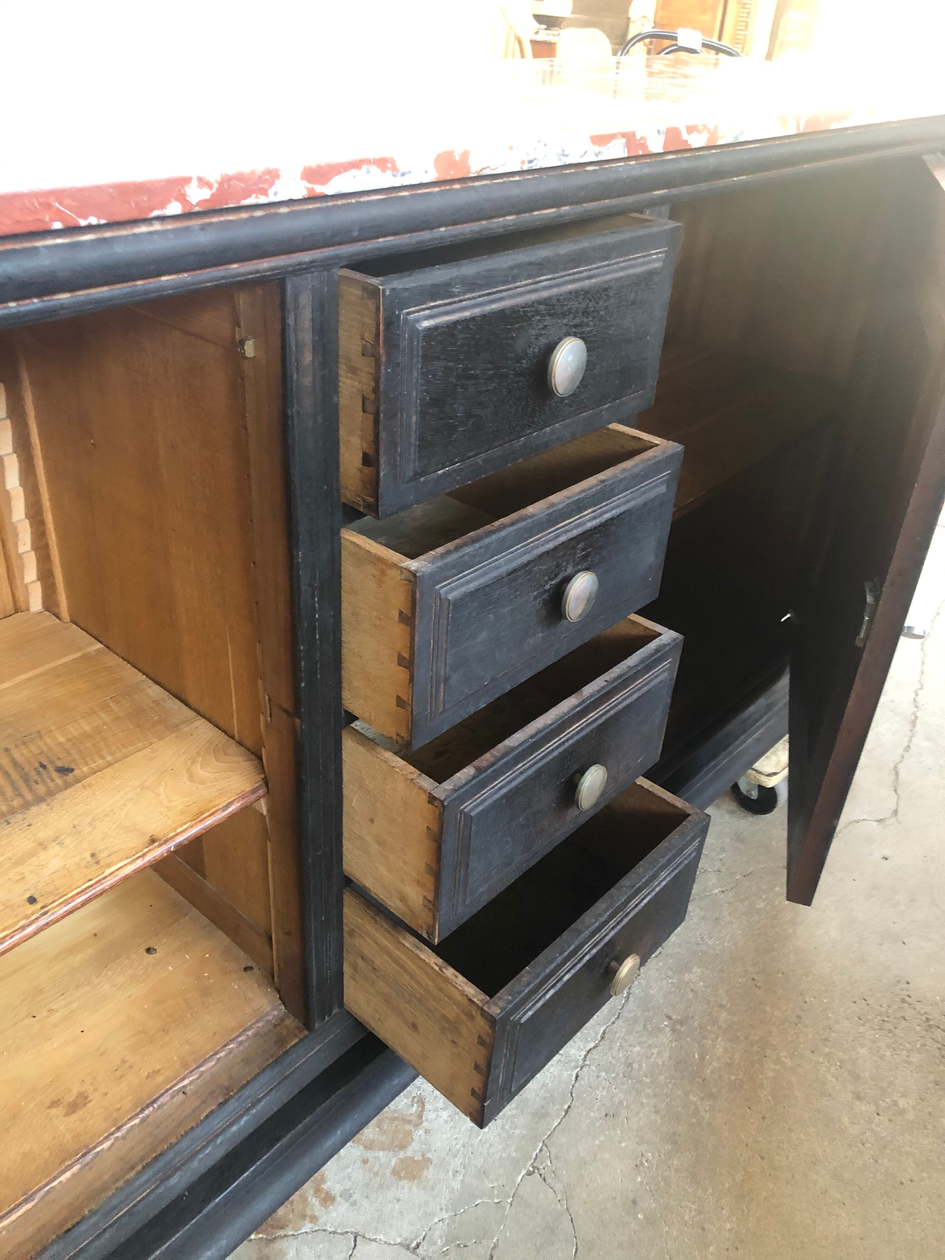 Blackened wooden sideboard of the 1950s
