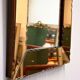 Striking French amber-coloured mirror with sculpted edge details, 1940s