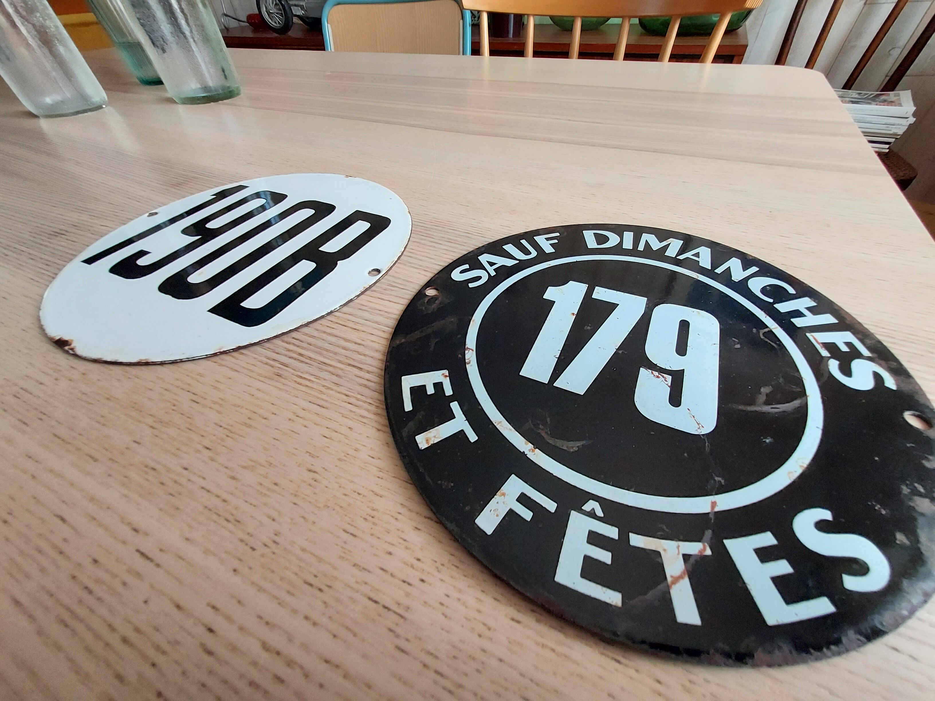 Enamelled city bus plates