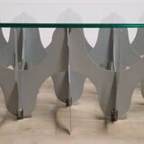 Minimalist sculptural coffee table in metal and glass