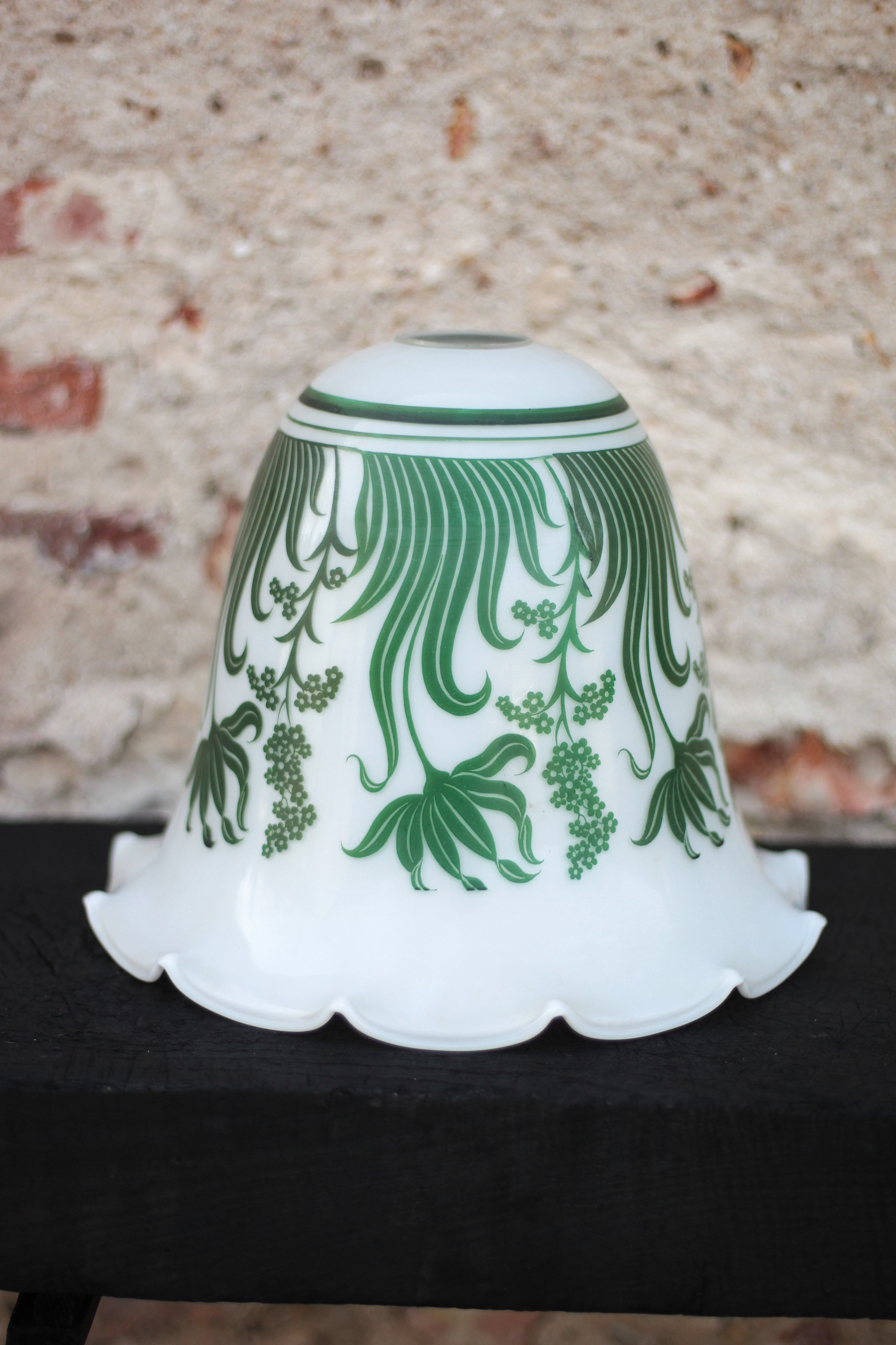 Opaline globe with green flower patterns, bell-shaped lampshade with a corolla.