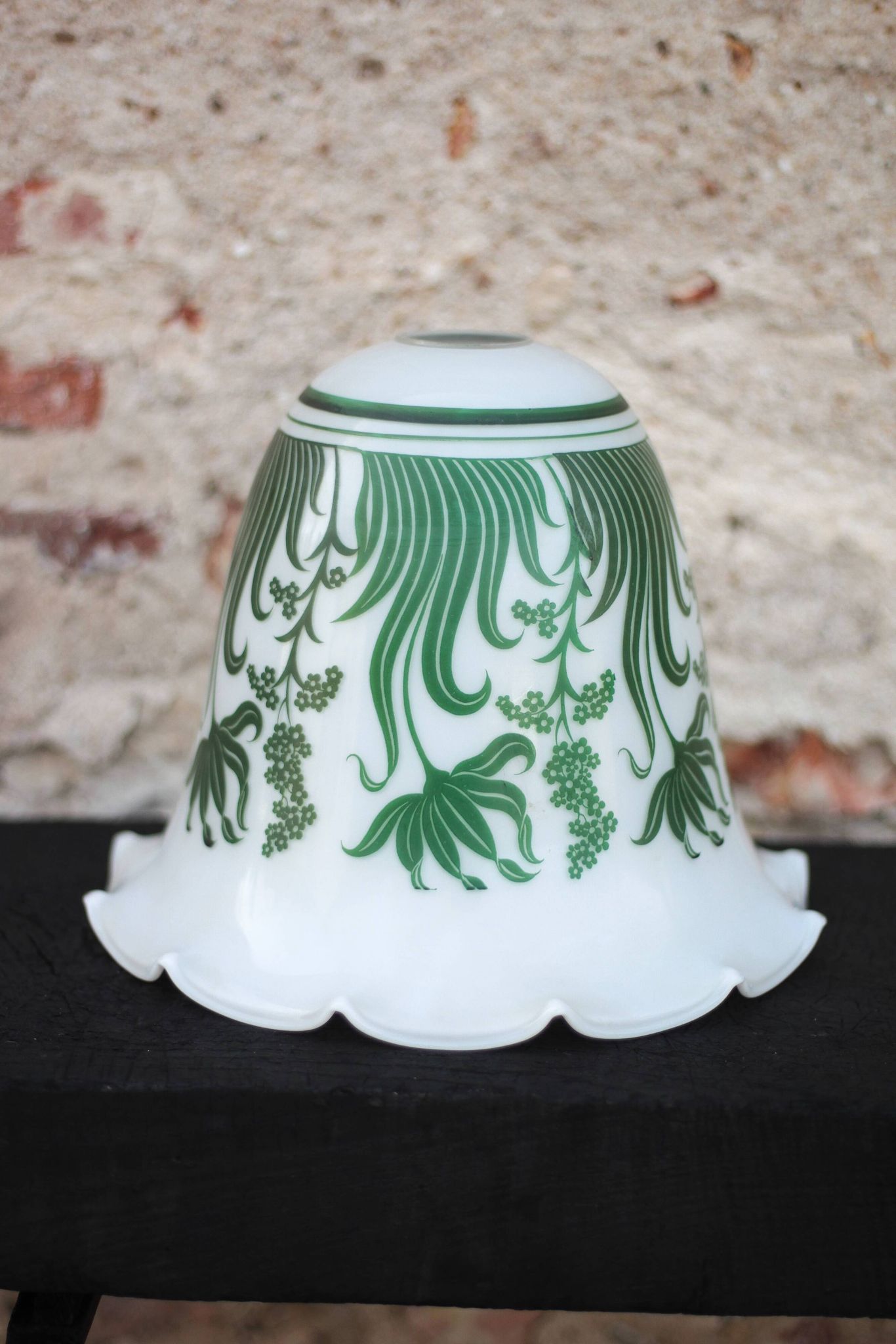 Opaline globe with green flower patterns, bell-shaped lampshade with a corolla.