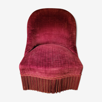 Red velvet armchair