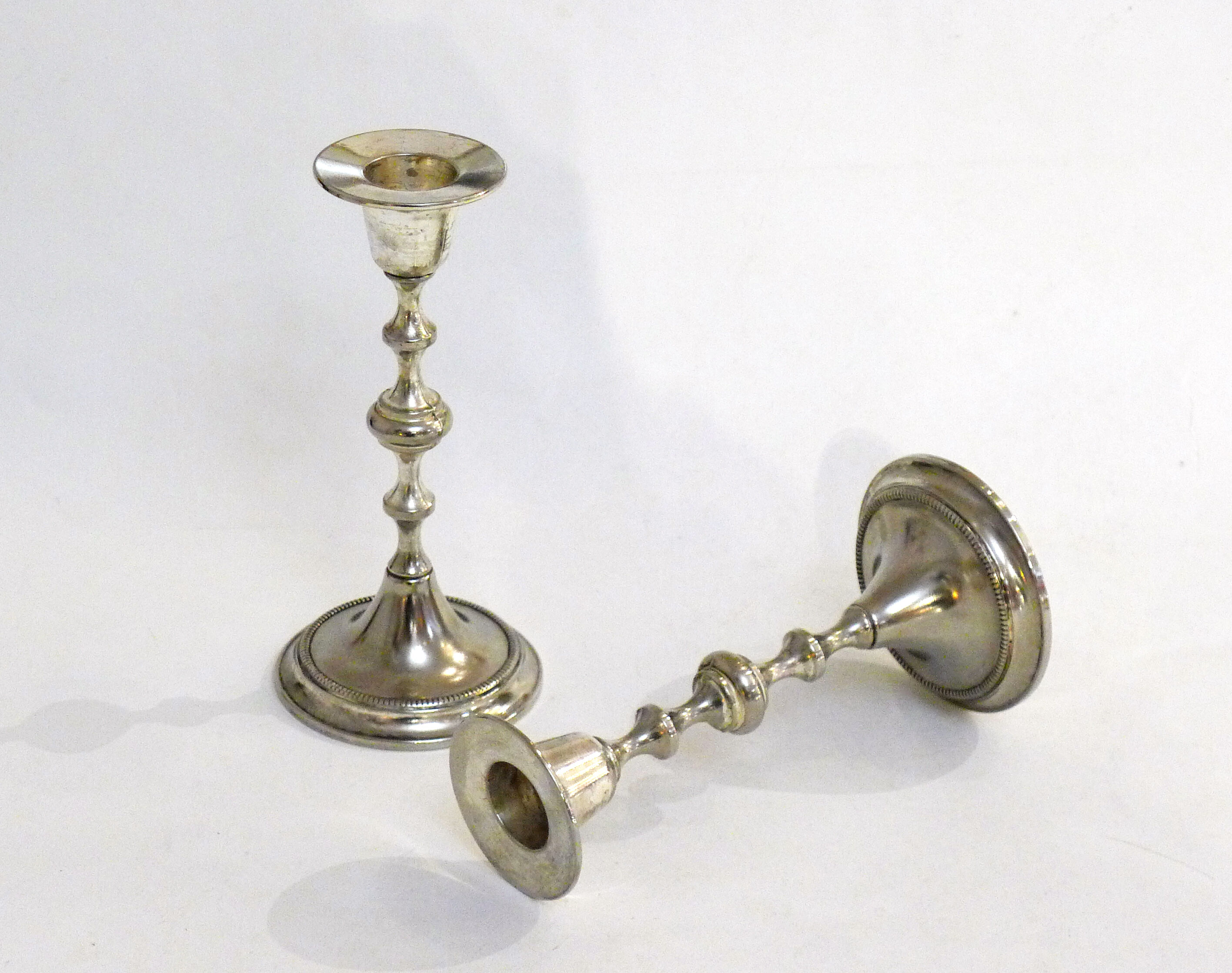 Pair of metal candle holders