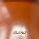 Red leather armchair in modern Italian style, signed Philippe Starck, 1980s.