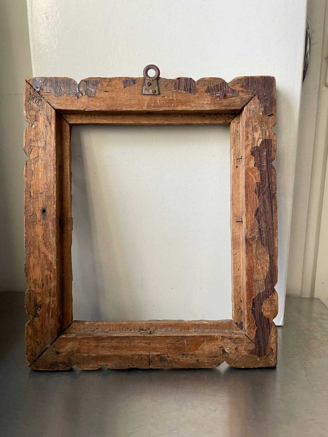 Antique handcarved frame   solid wood 33.5  x 29 cm  opening measurements 23.5 cm x 19 cm cedar wood