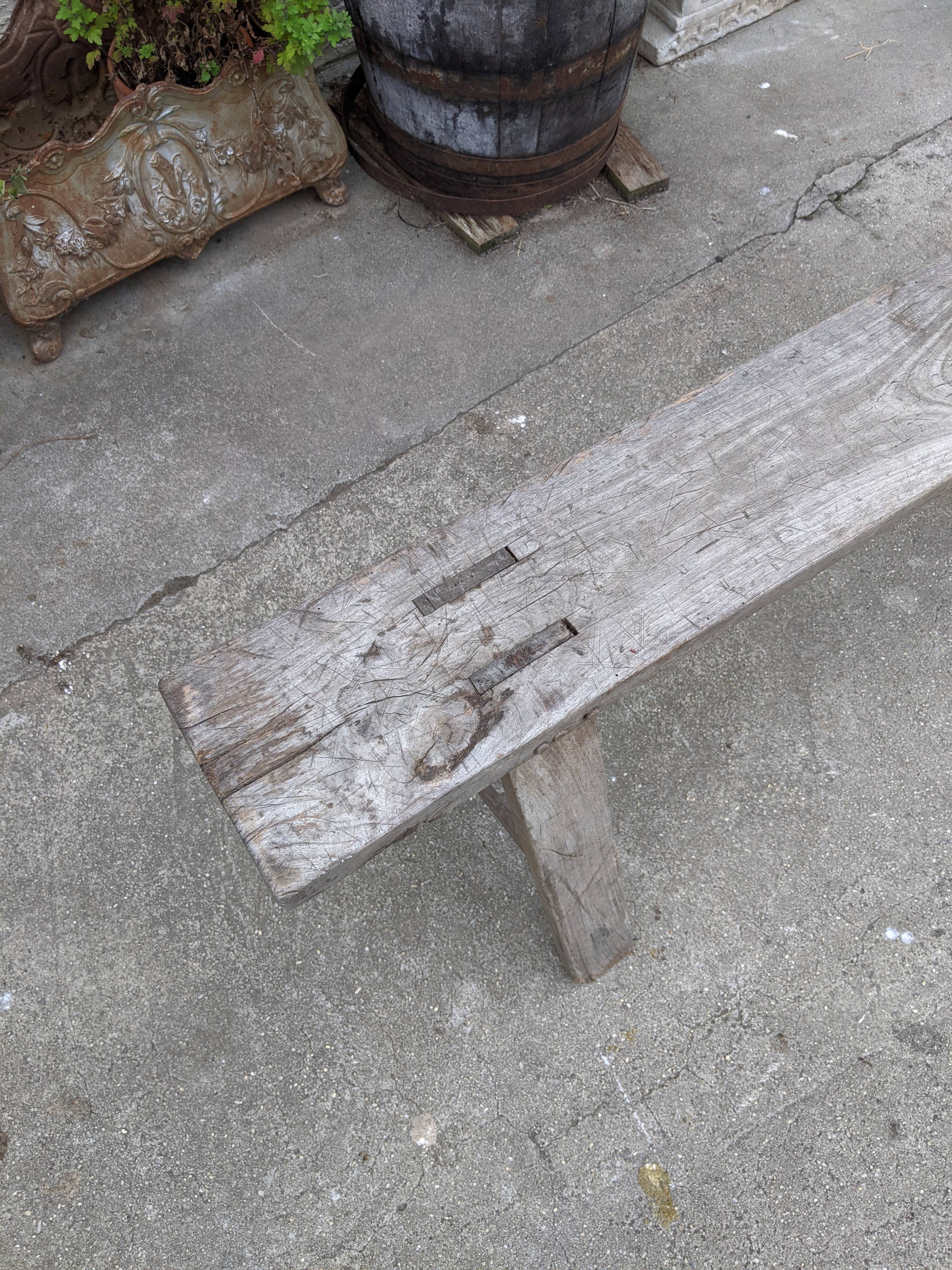 Old farm bench in chene