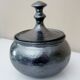 Black metal glazed ceramic bonbonnière, signed Jean Marais Vallauris