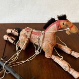 Wooden puppet horse