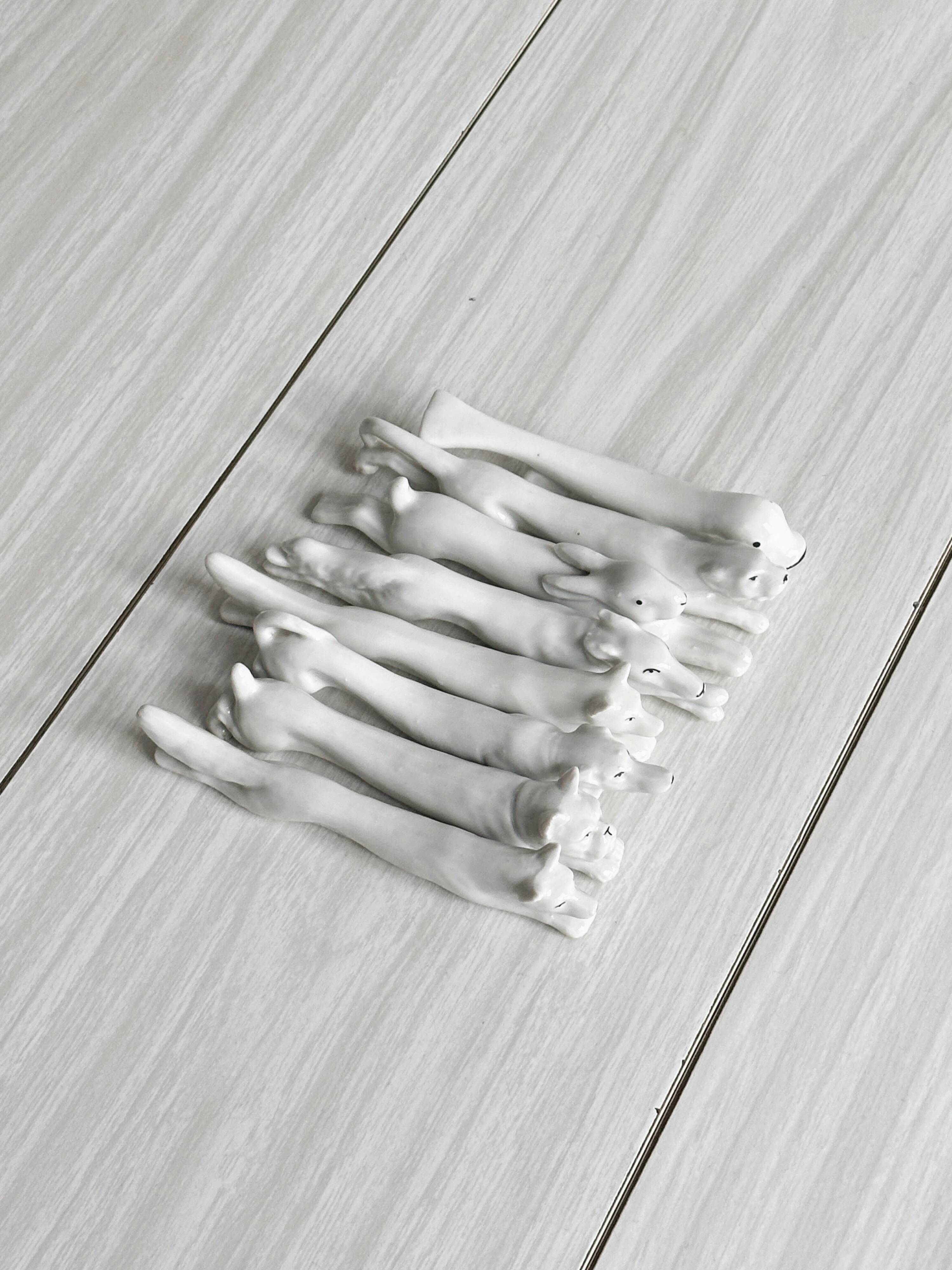 Porcelain animal knife holder.