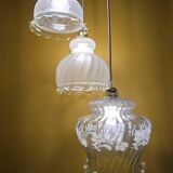 Original suspension of three vintage transparent glass globes.