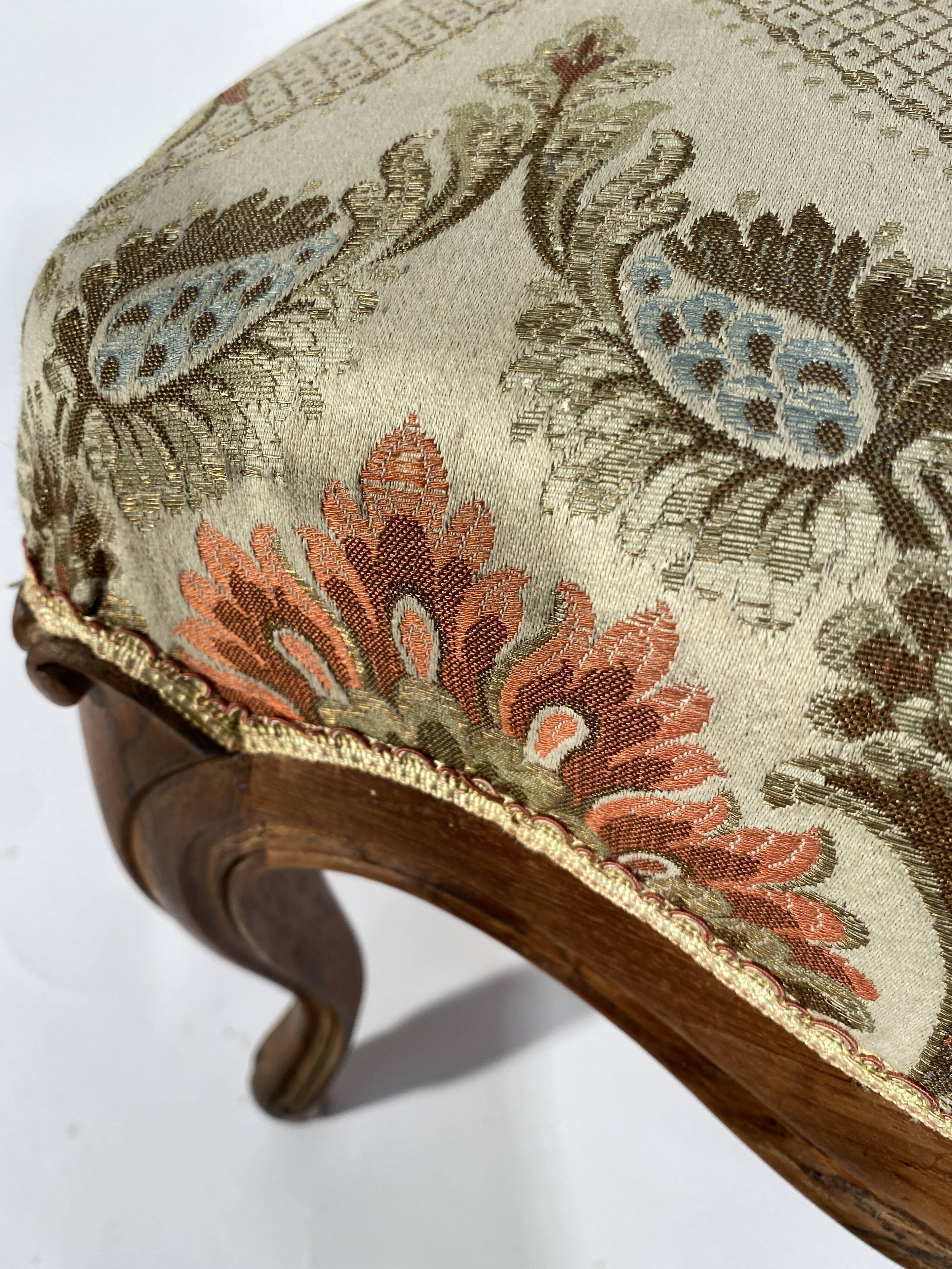 Louis XV style living room including a pair of armchairs and three chairs