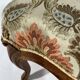 Louis XV style living room including a pair of armchairs and three chairs