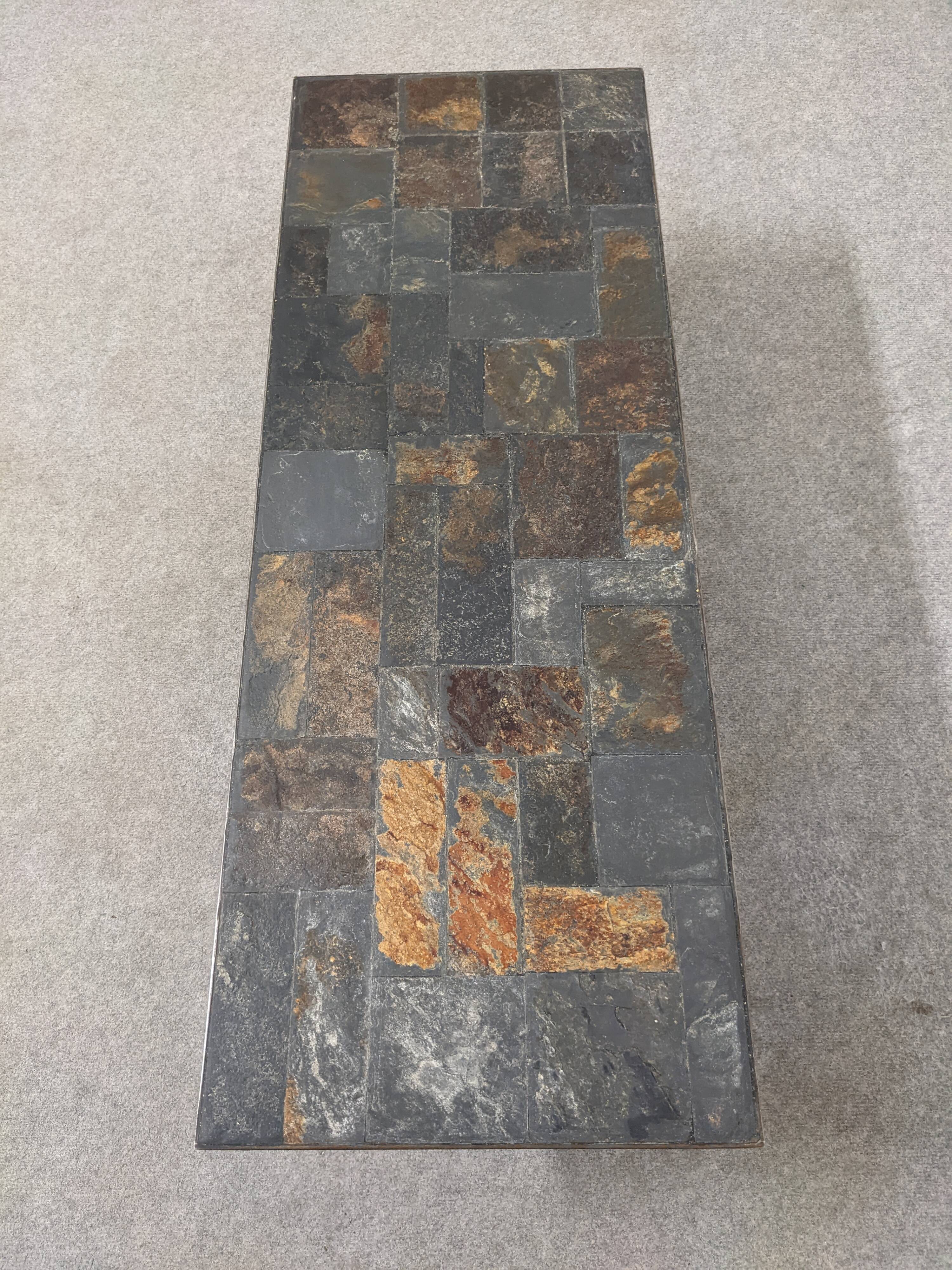 Brutalist coffee table in natural stone and wrought iron from the 60s/70s