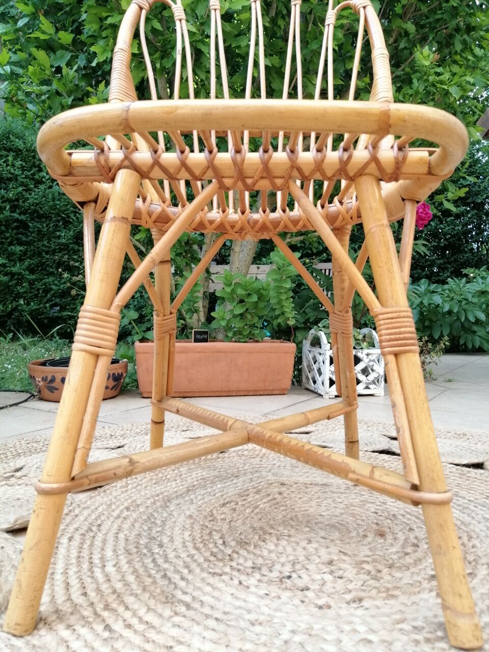 Series of 4 vintage rattan chairs.