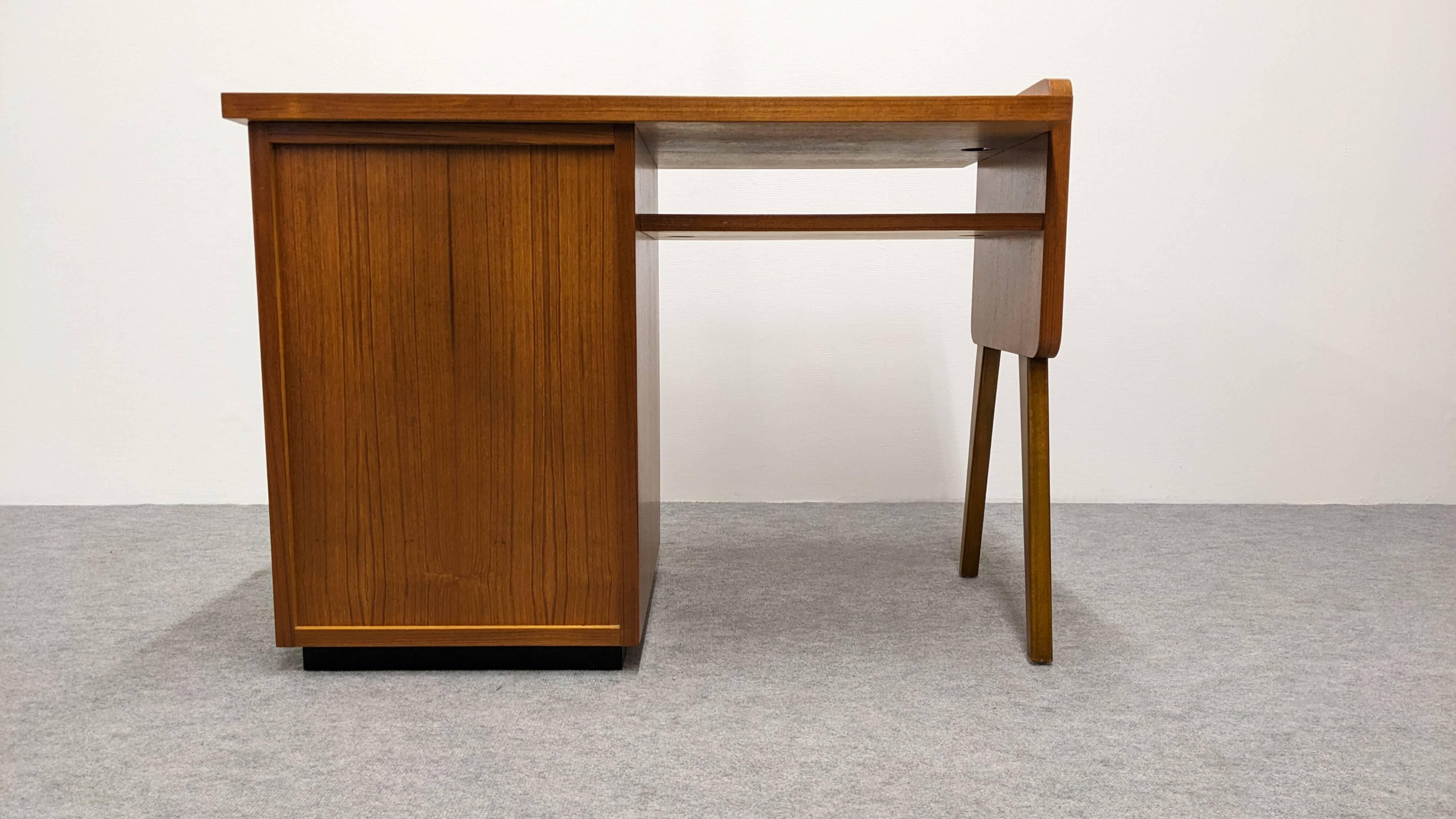 Modernist desk in blonde rosewood, France circa 1960.