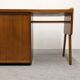Modernist desk in blonde rosewood, France circa 1960.