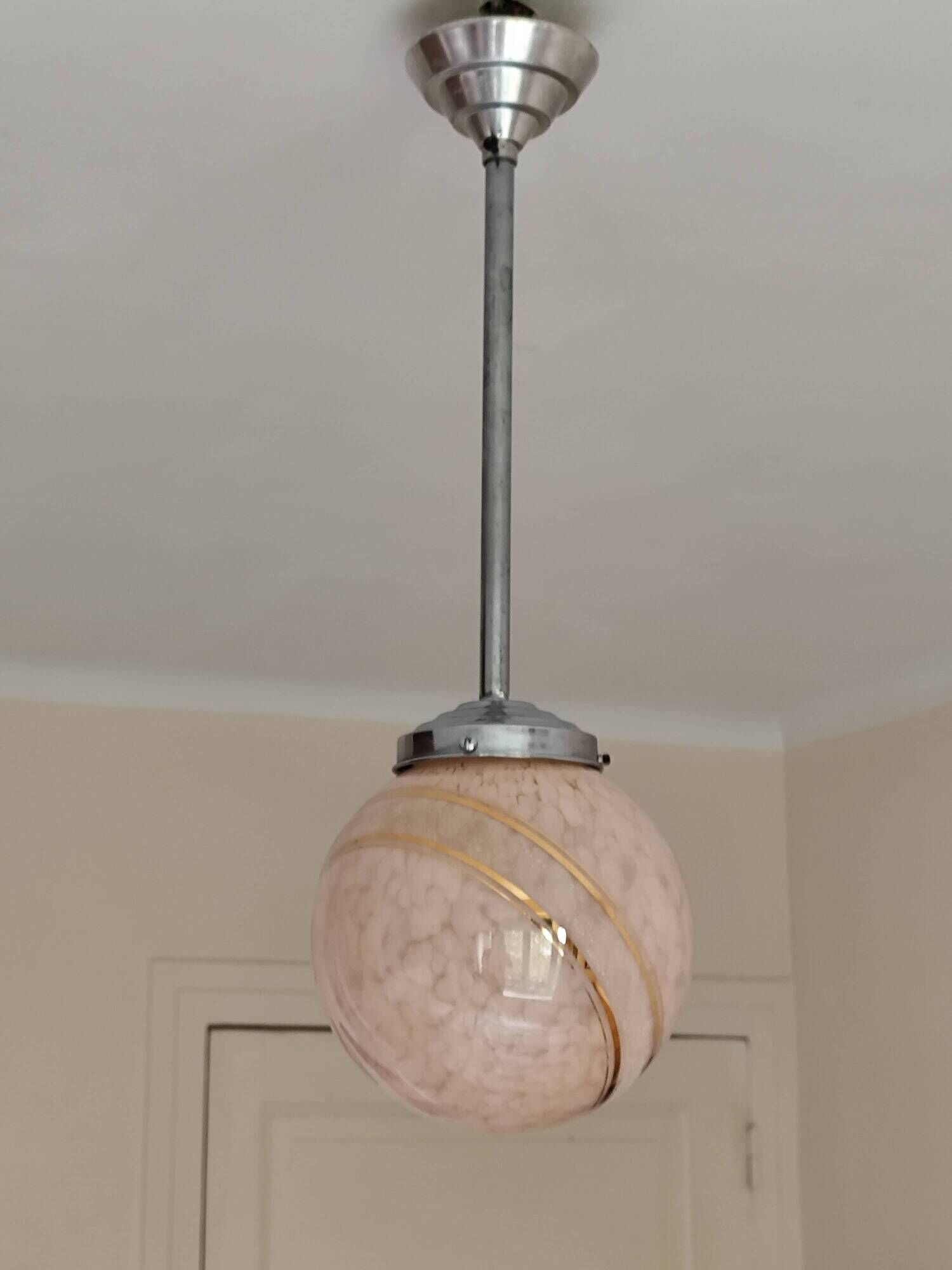 suspension glass globe pink and gold on a metal aluminium stem and structure