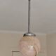 suspension glass globe pink and gold on a metal aluminium stem and structure