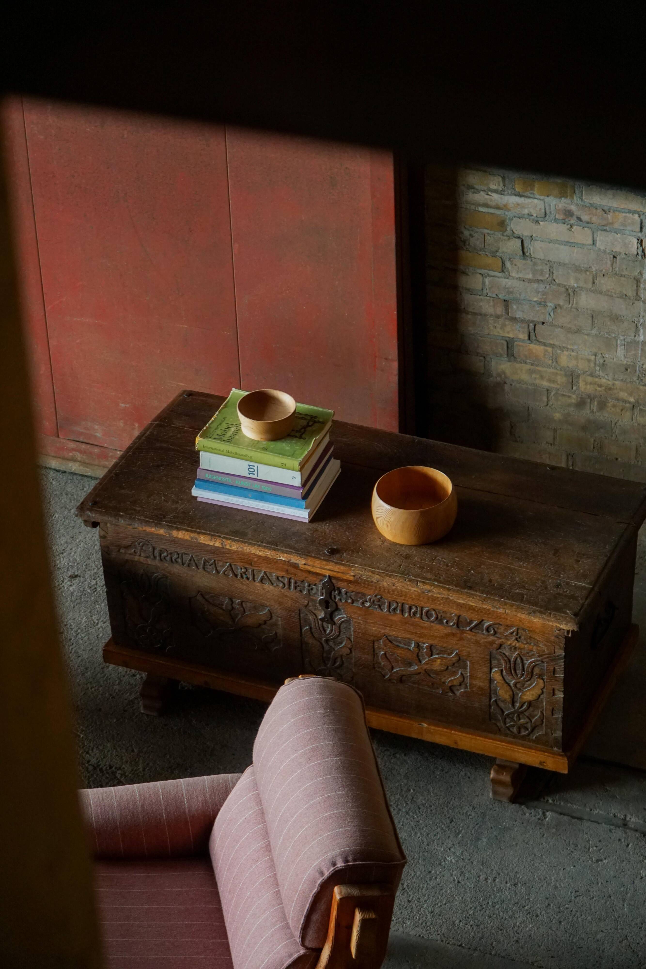 18th-century Scandinavian popular art oak chest with carved panels, dated 1764.