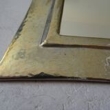 Hammered metal mirror design
