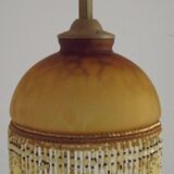Vintage French amber mottled glass hanging ceiling light with beaded fringe.