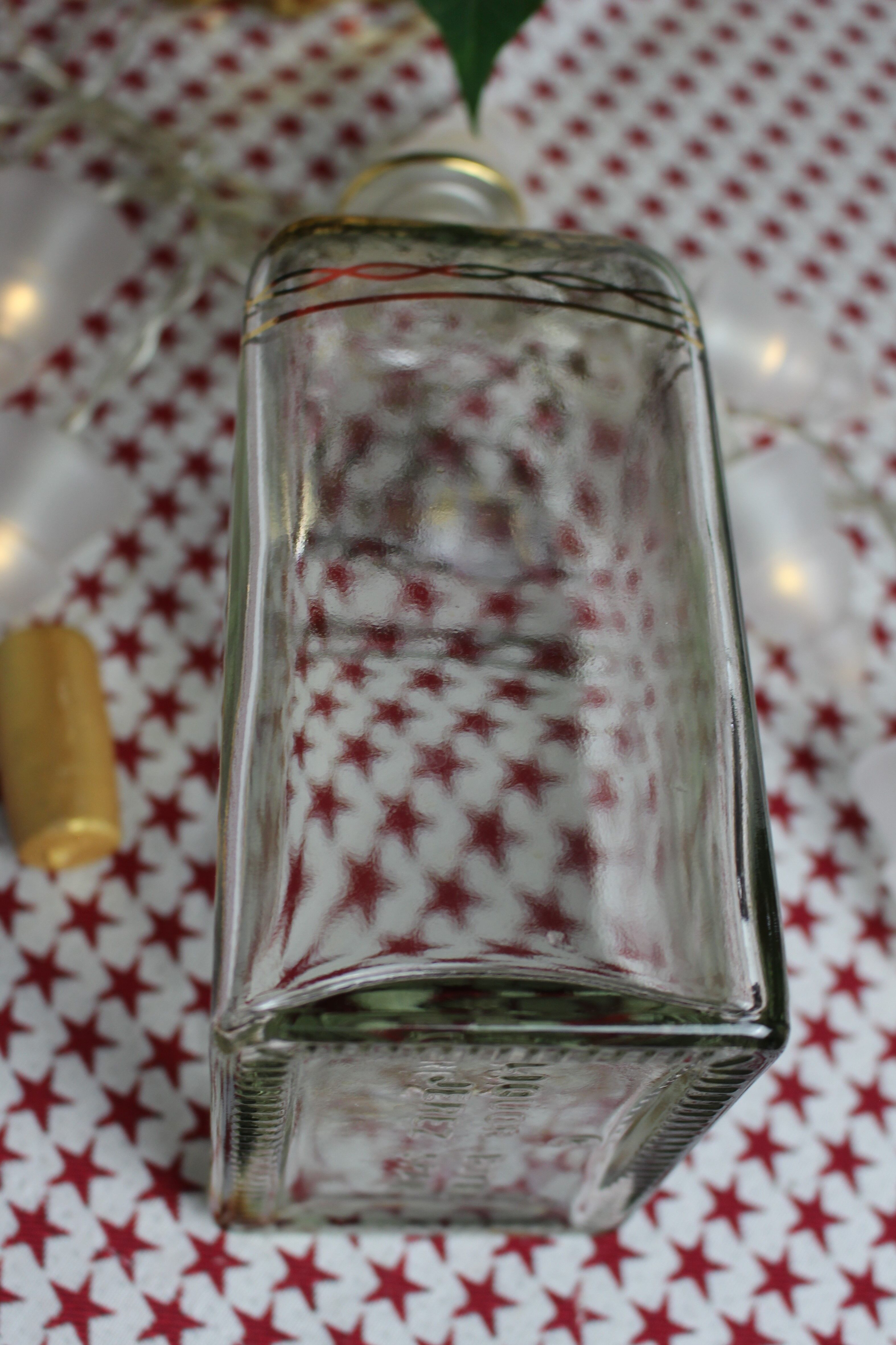Decorated rectangular glass carafe