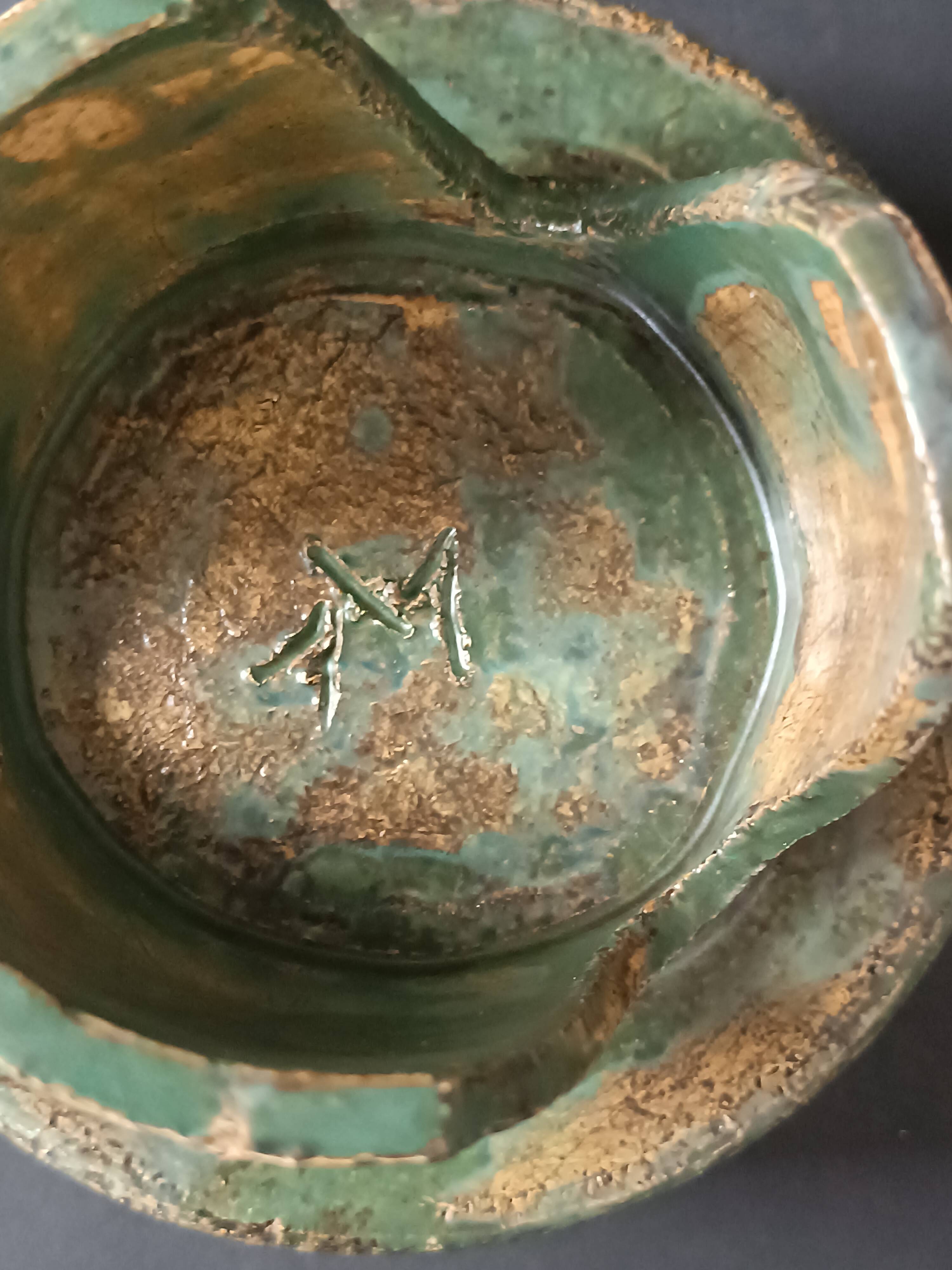 Footed dish in chamotte stoneware green with signature 1960