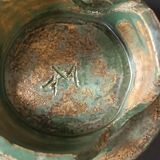 Footed dish in chamotte stoneware green with signature 1960