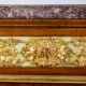 Empire style chest of drawers in lacquer, bronze and marble. Nineteenth century.