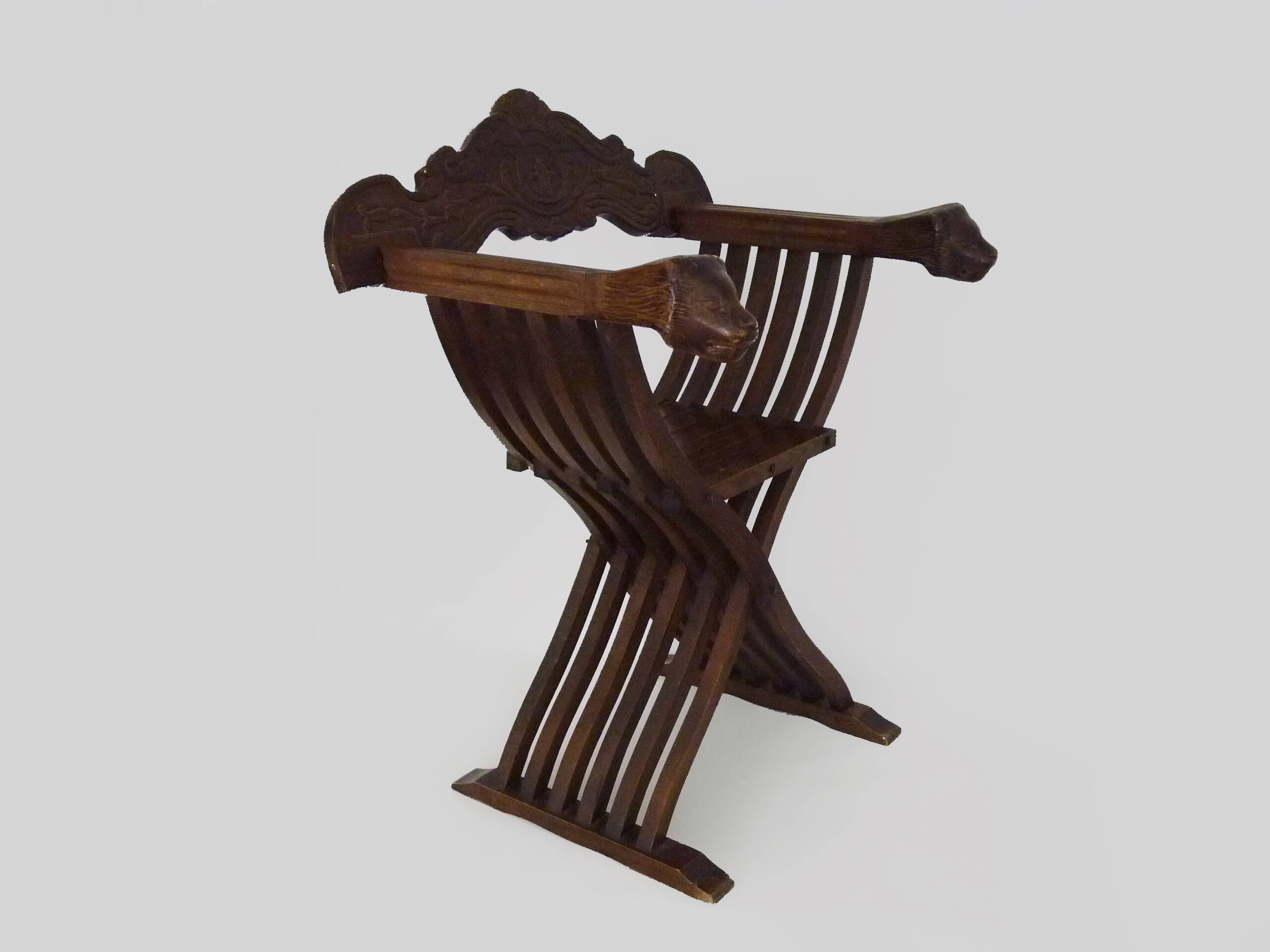 Vintage Savonarola chair with lion head, wood, Italy, 1950s