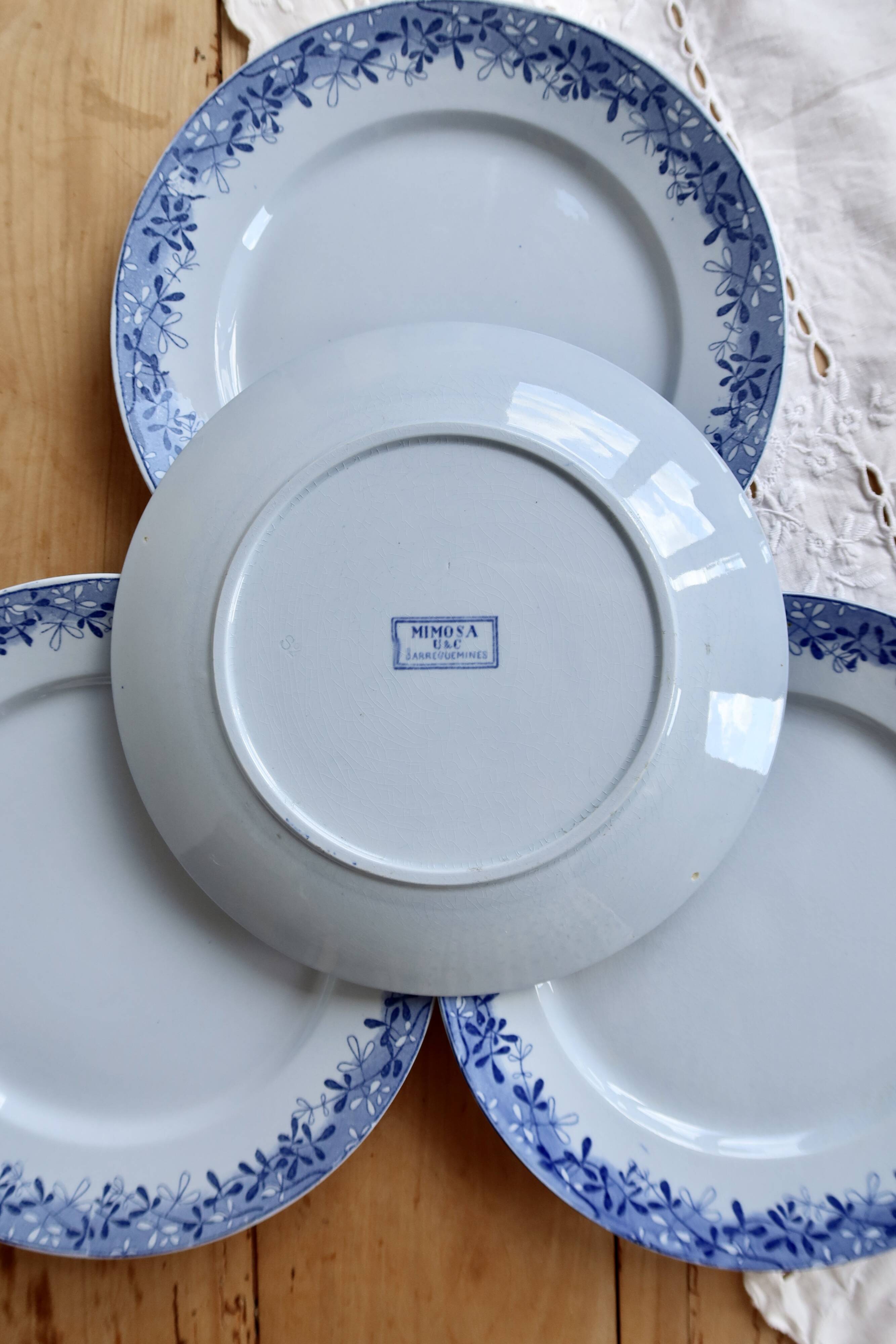 4 antique flat plates from Sarreguemines U&C in the Mimosa blue pattern.