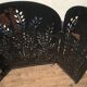 Wrought and cut metal fire screen