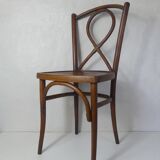 Old curved wooden bistro chair